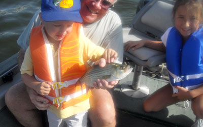 <p>Garry teaching the grandkids to get out and enjoy fishing</p>